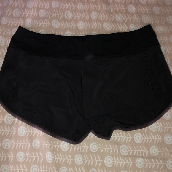 Two pairs of black Lulu Lemon shorts, size medium. - Picture 4 of 9